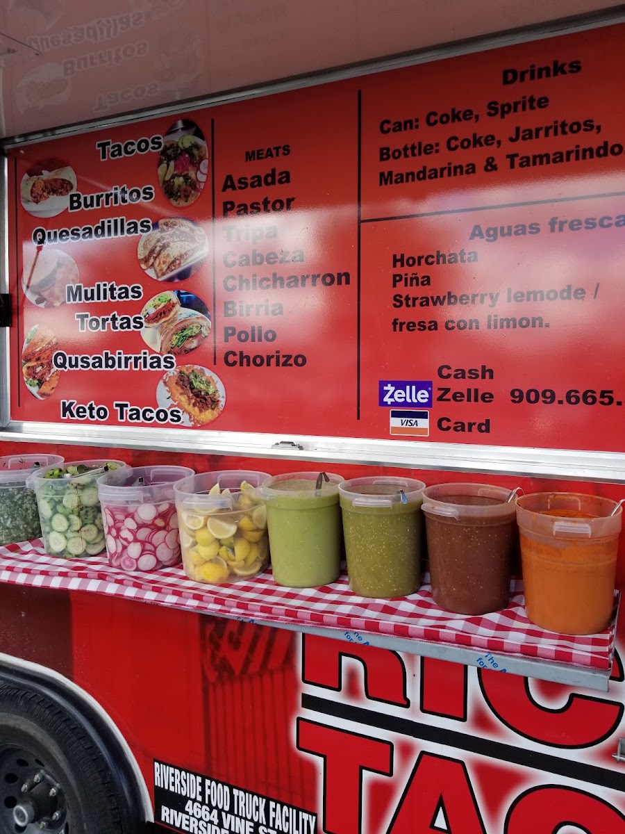 Ricos tacos Latortillera menu board