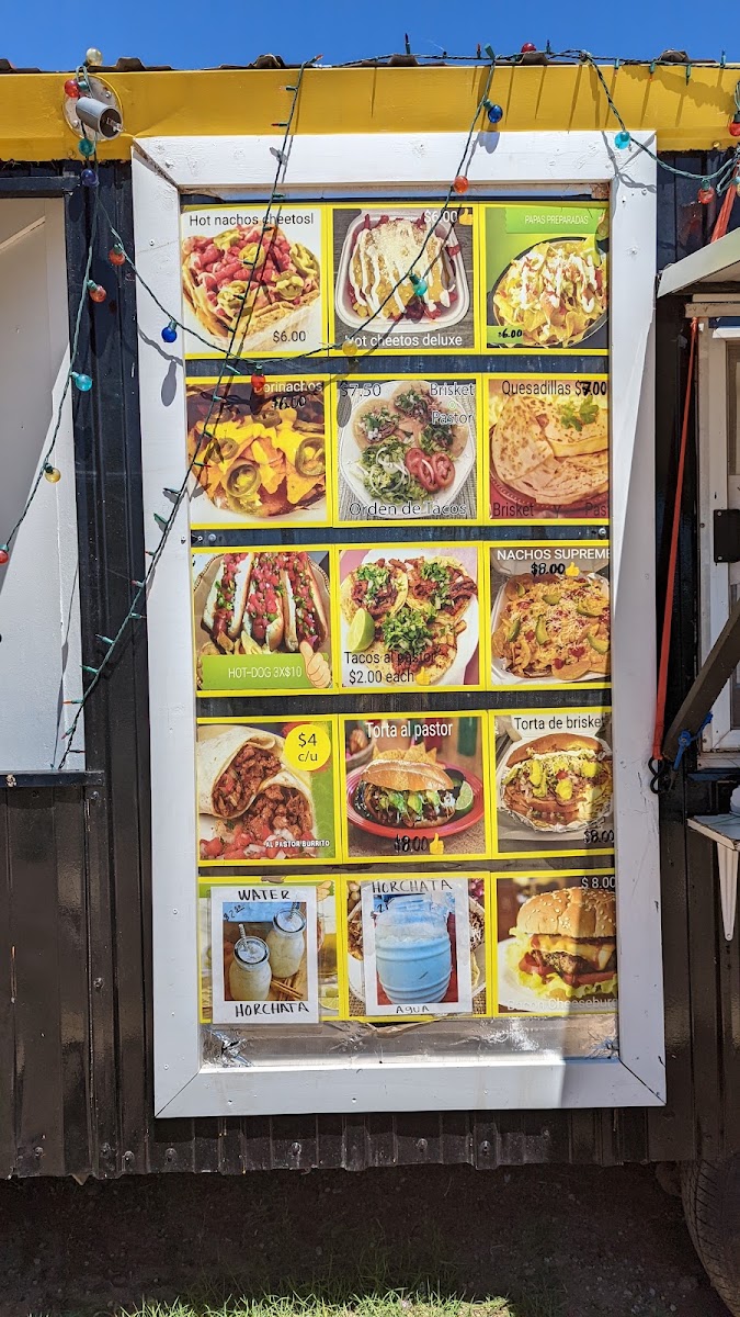 Rico’s Elotes Carrasco menu board