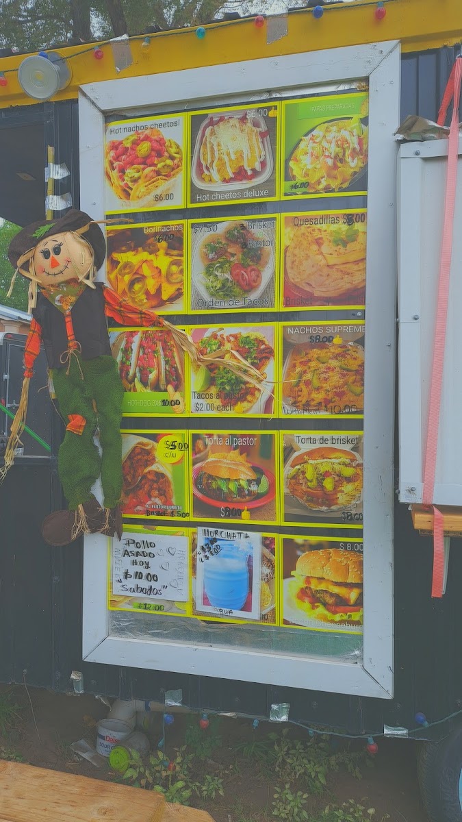 Rico’s Elotes Carrasco menu board