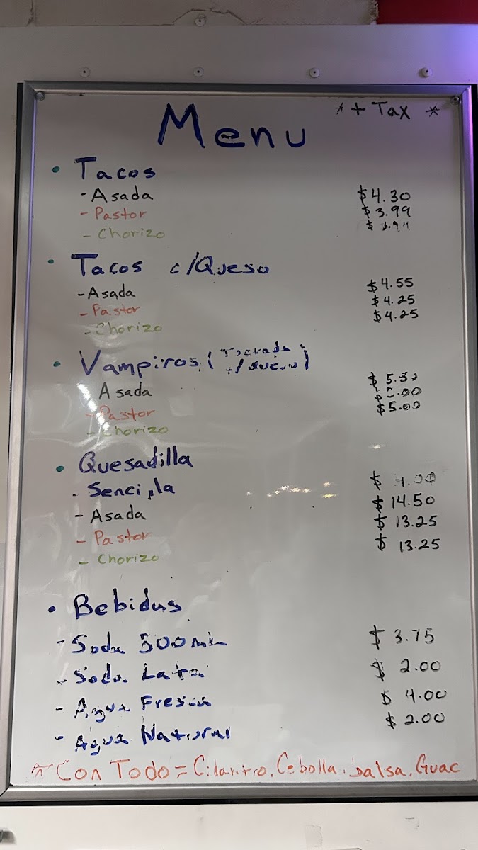 Tacos El Tijuanense menu board