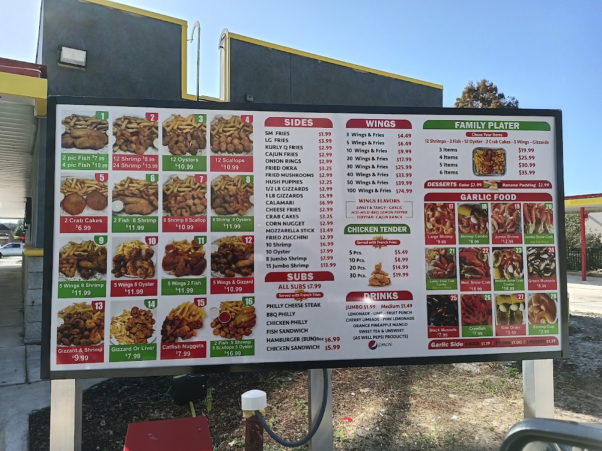 Tasty seafood chicken and subs menu board