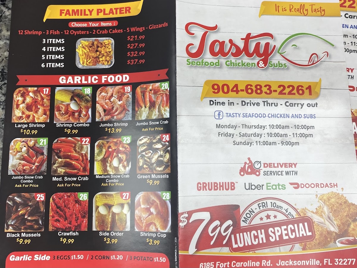 Tasty seafood chicken and subs menu board