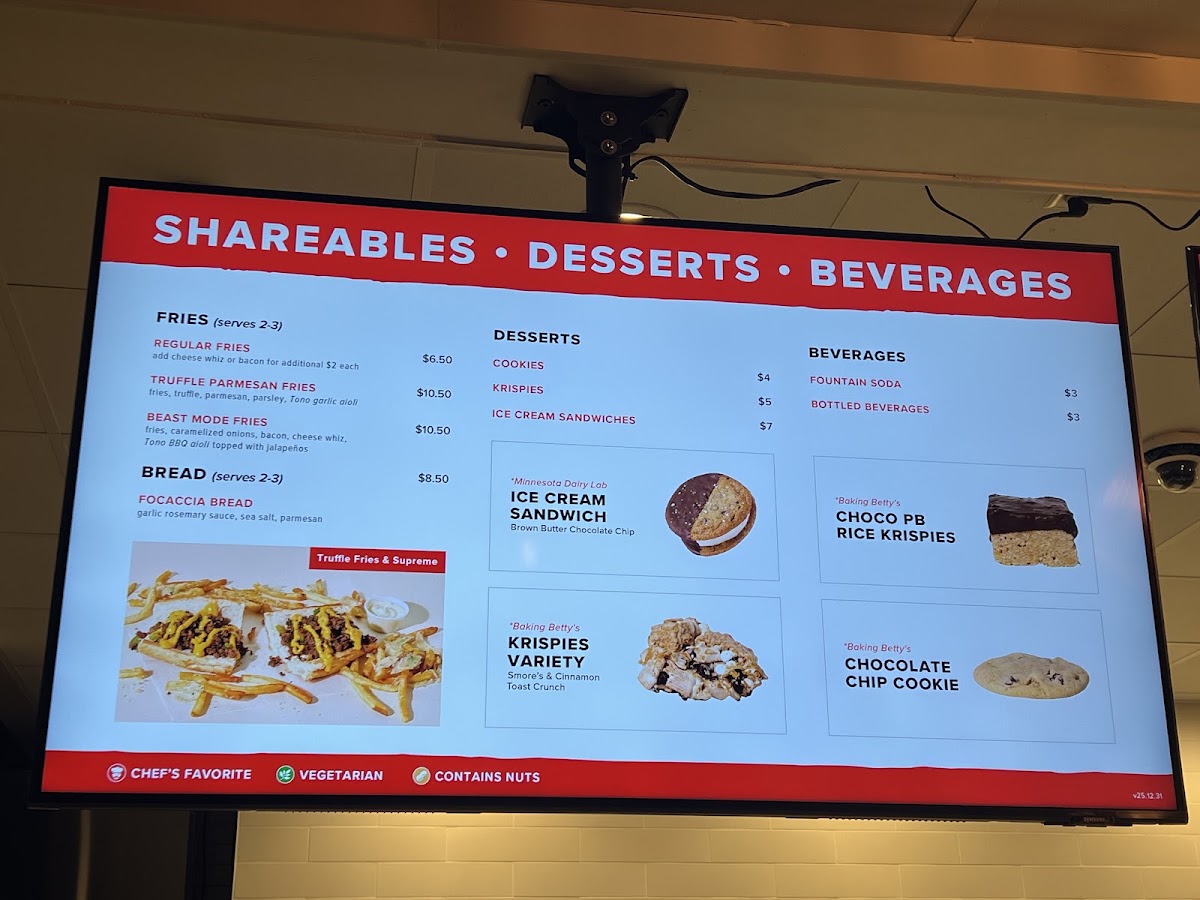 Tono Pizzeria + Cheesesteaks menu board