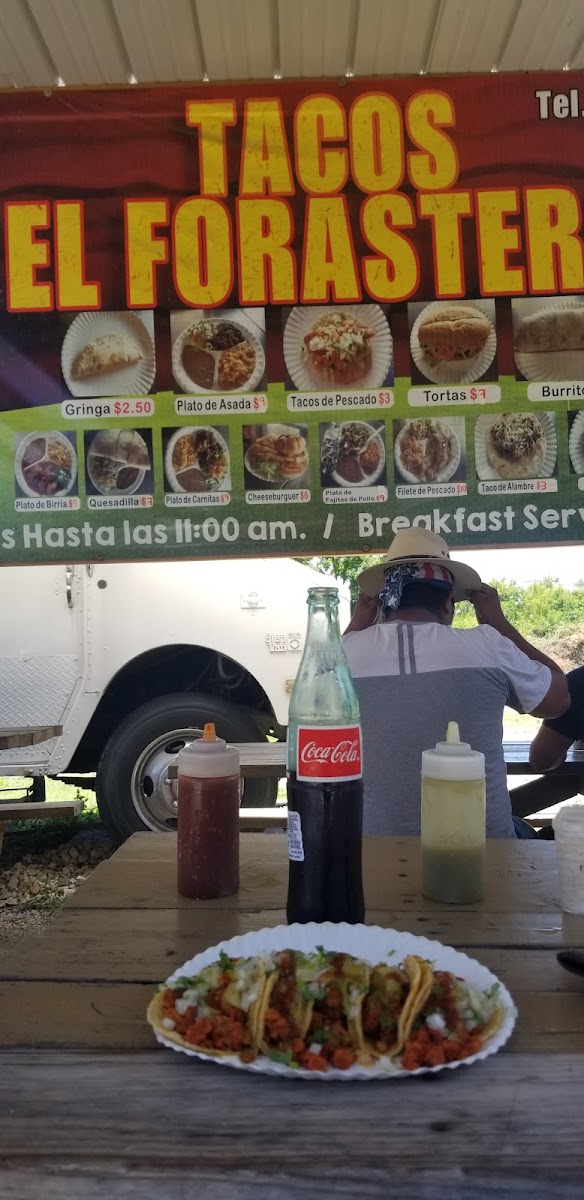 Tacos El Forastero menu board
