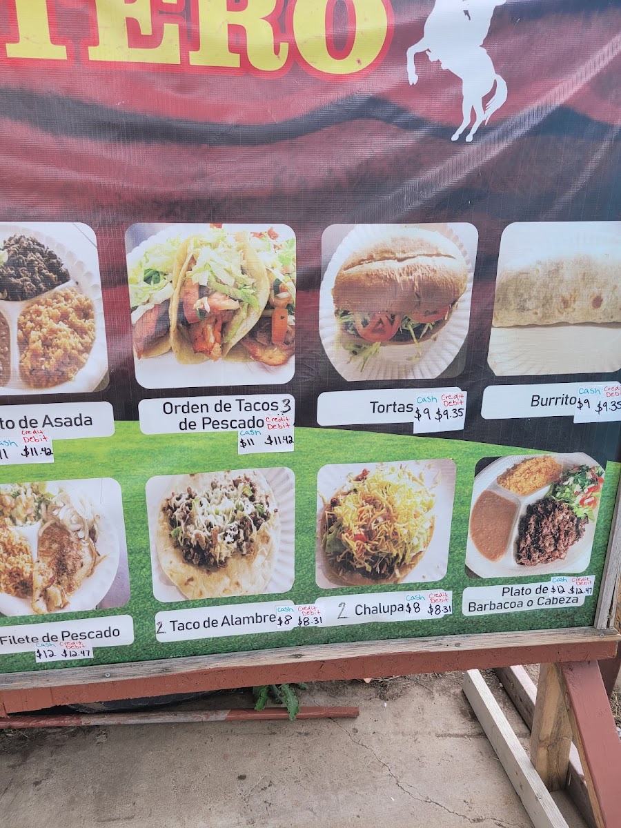 Tacos El Forastero menu board