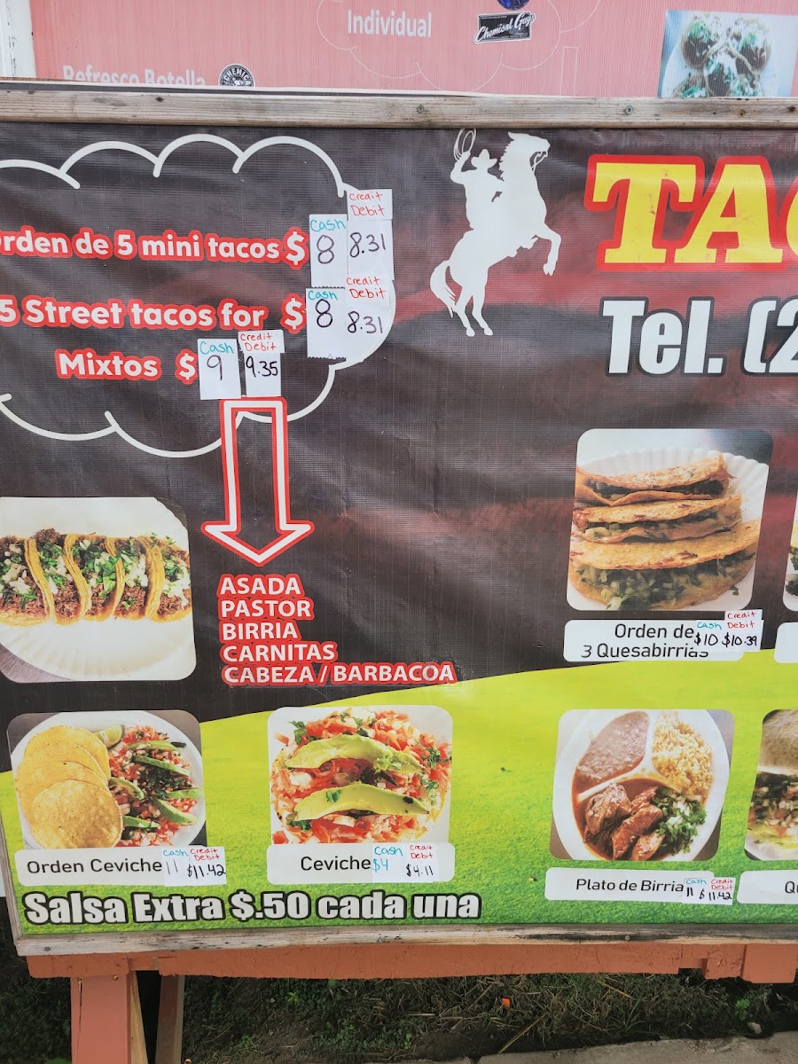 Tacos El Forastero menu board