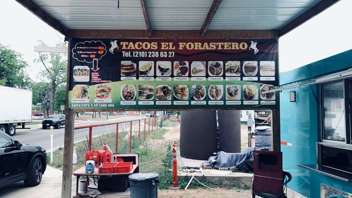 Tacos El Forastero menu board