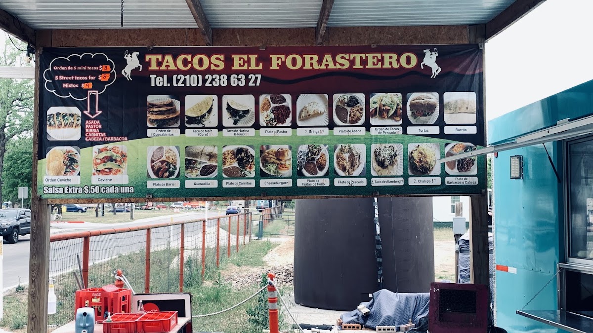 Tacos El Forastero menu board