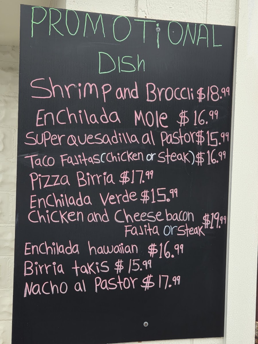 1942 Tacos & Tequila menu board