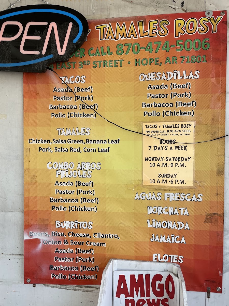 Tacos y tamales Rossy menu board