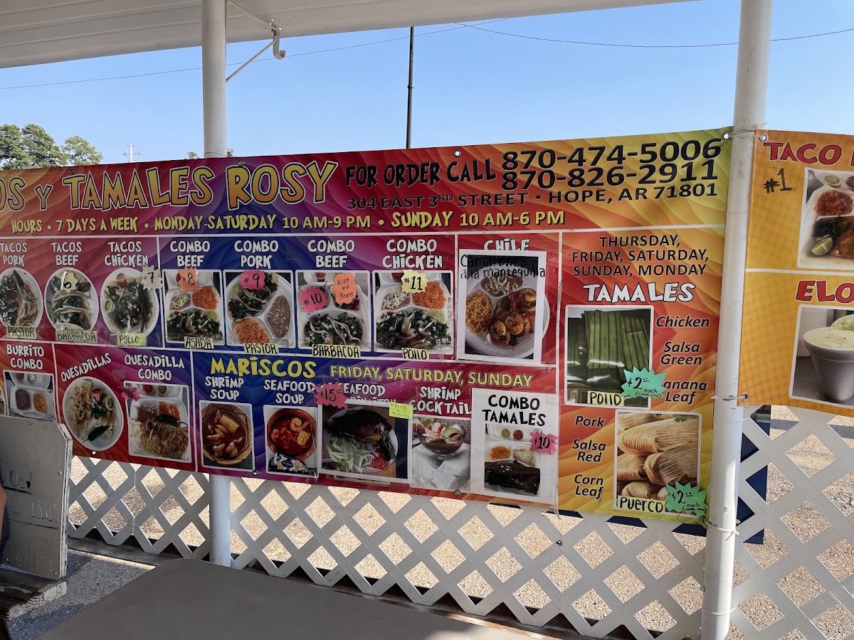 Tacos y tamales Rossy menu board