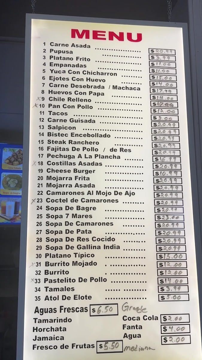 Las Champas Restaurant y Pupuseria menu board