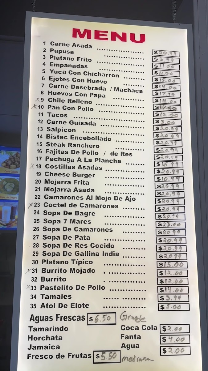 Las Champas Restaurant y Pupuseria menu board