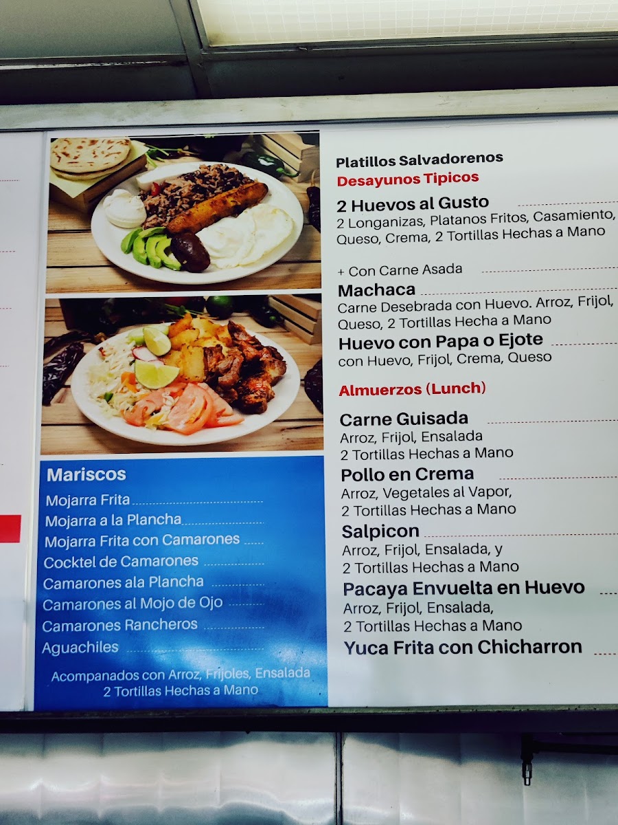 Las Champas Restaurant y Pupuseria menu board
