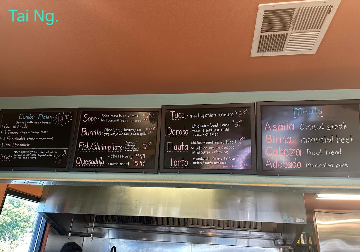 El Abajeño Tacos menu board