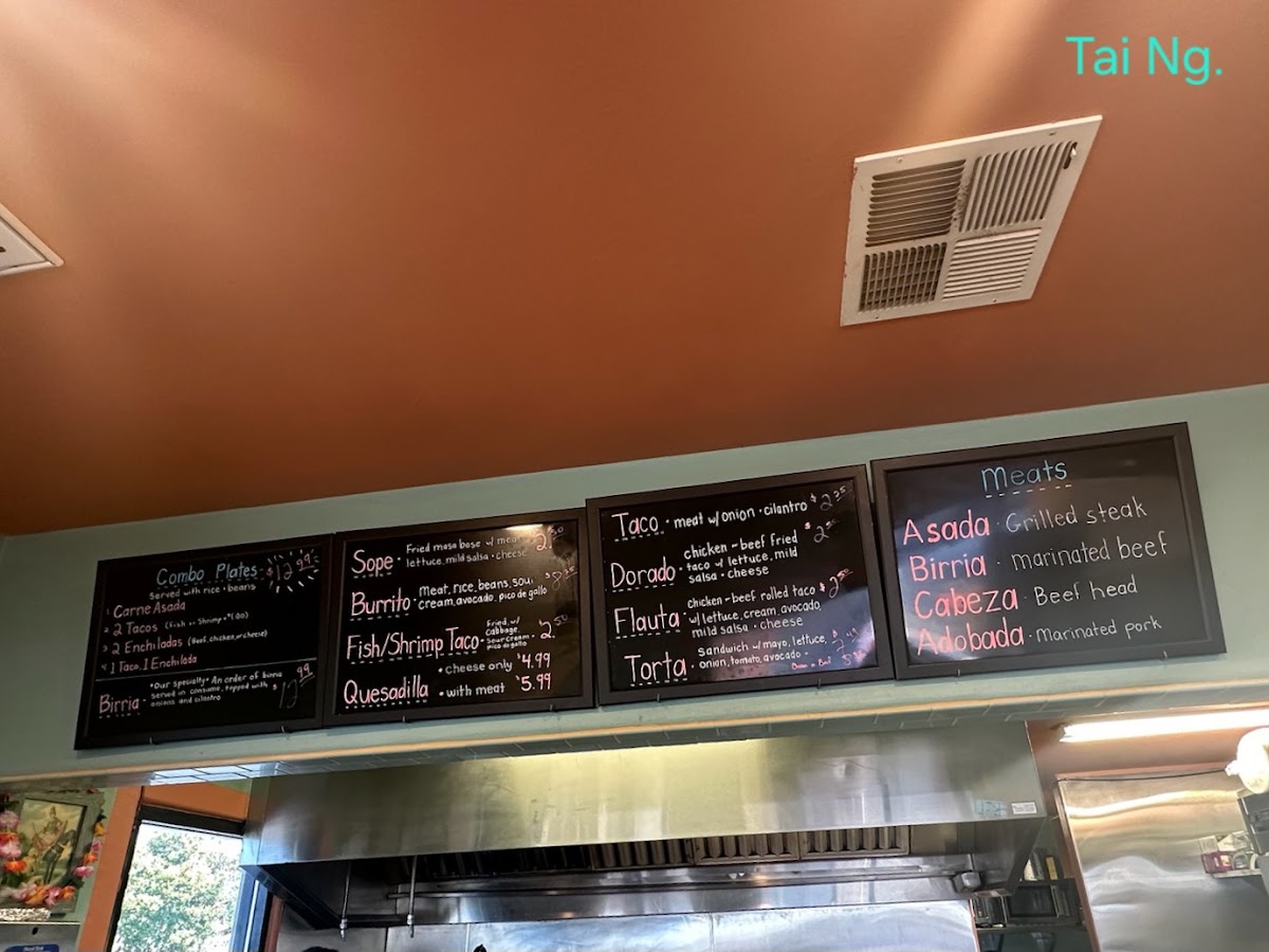 El Abajeño Tacos menu board