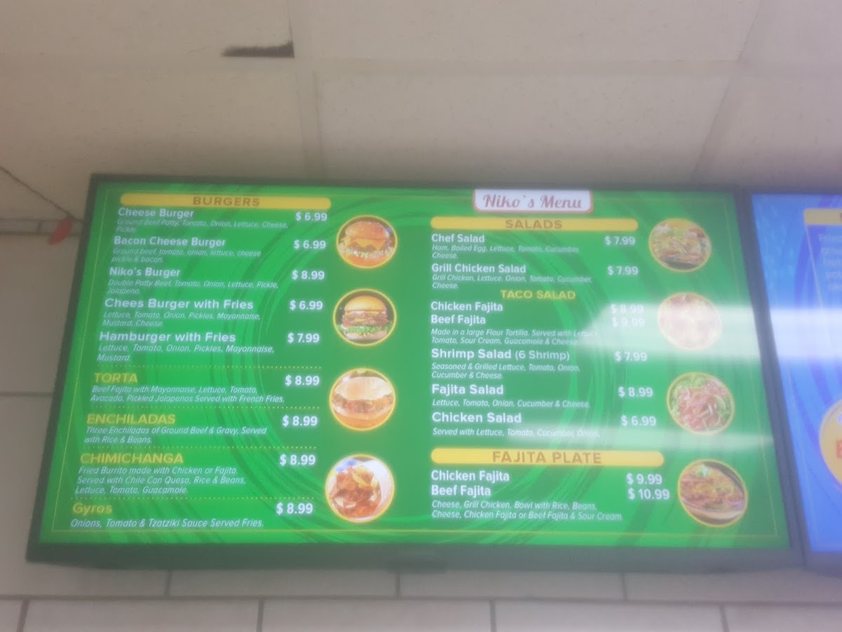 Niko's Grill menu board