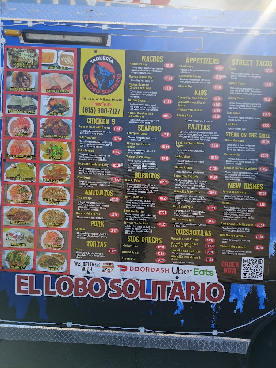 Taqueria el lobo solitario menu board