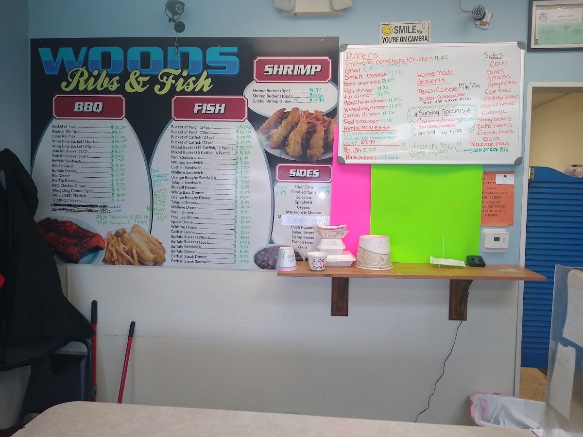 Wood's Ribs & Fish menu board