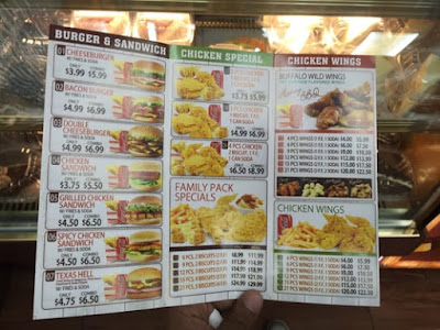 Tex's Chicken & Burgers menu board