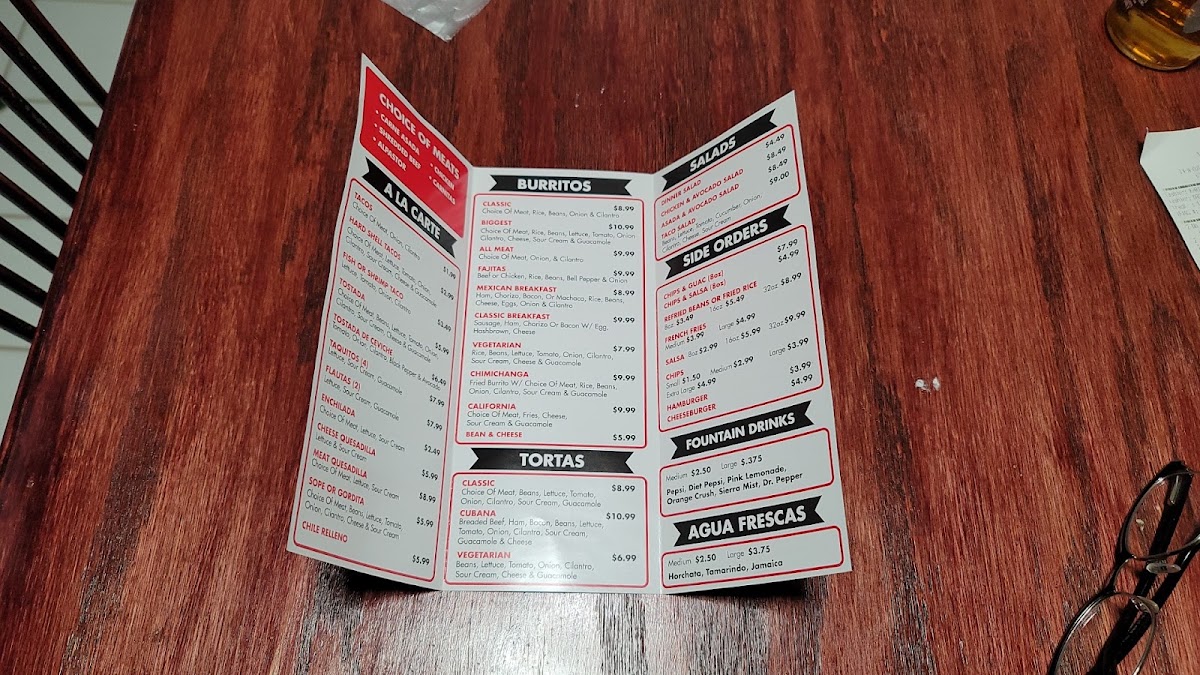 Clasico Tacos menu board