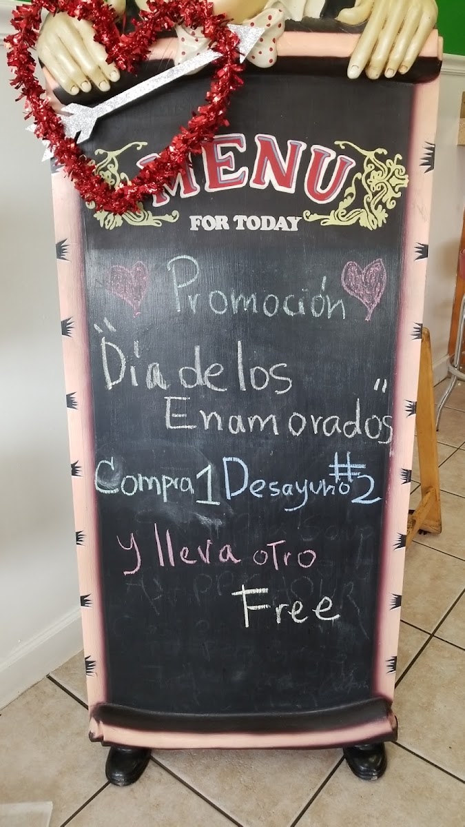 Cafetería cubana La Guajira menu board