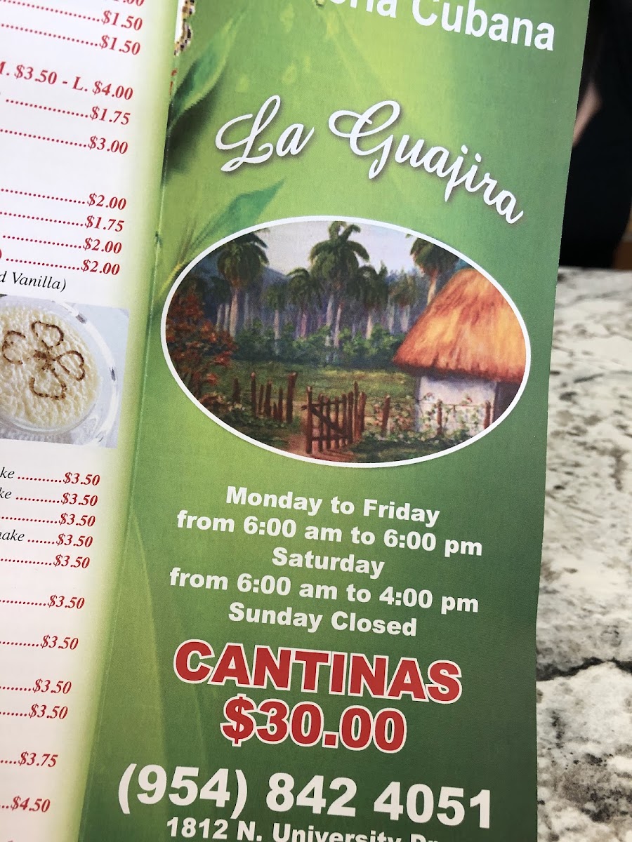 Cafetería cubana La Guajira menu board