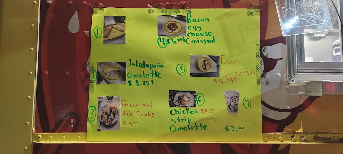 Tacos El Calentano menu board