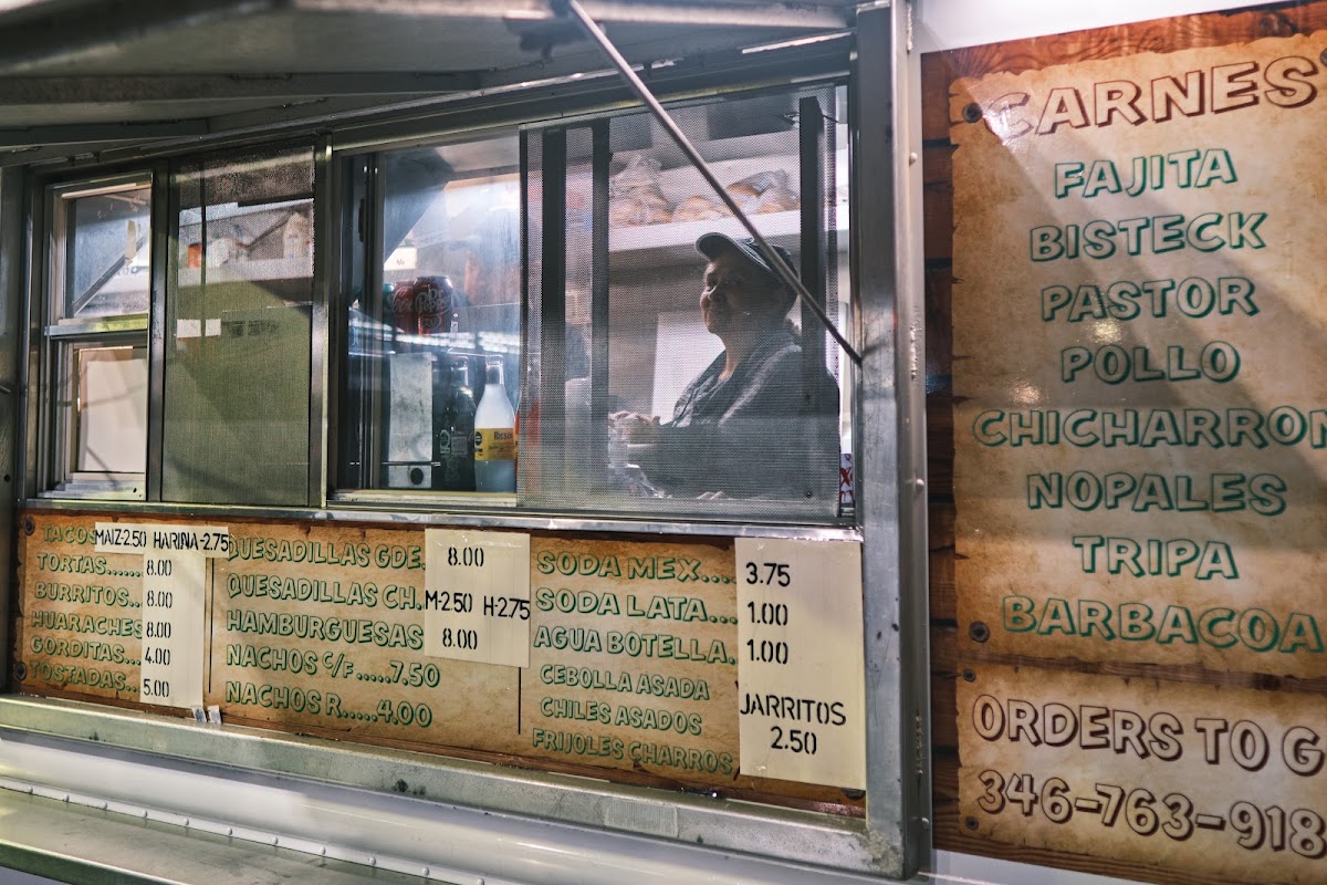 Taqueria El Serranito menu board