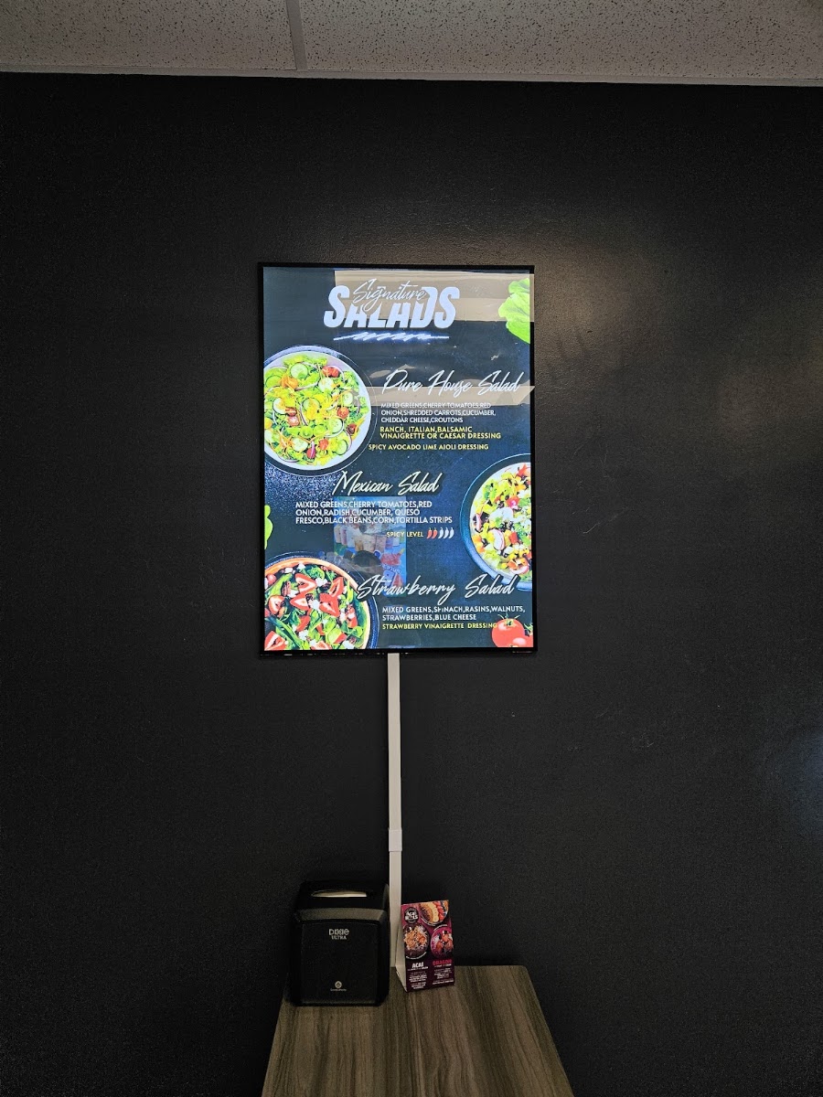 Pure Fruit Bar & Deli LLC menu board