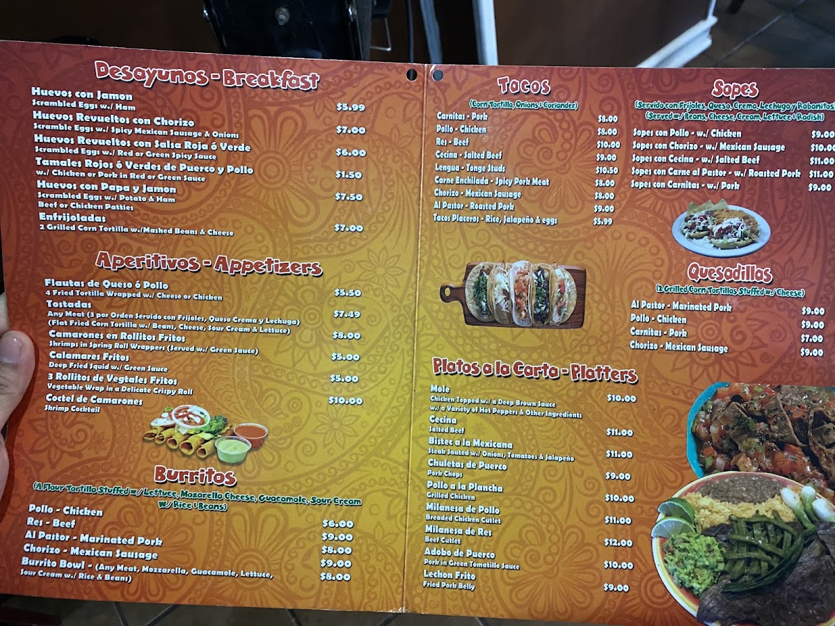 La Morenita Taqueria and Restaurant menu board