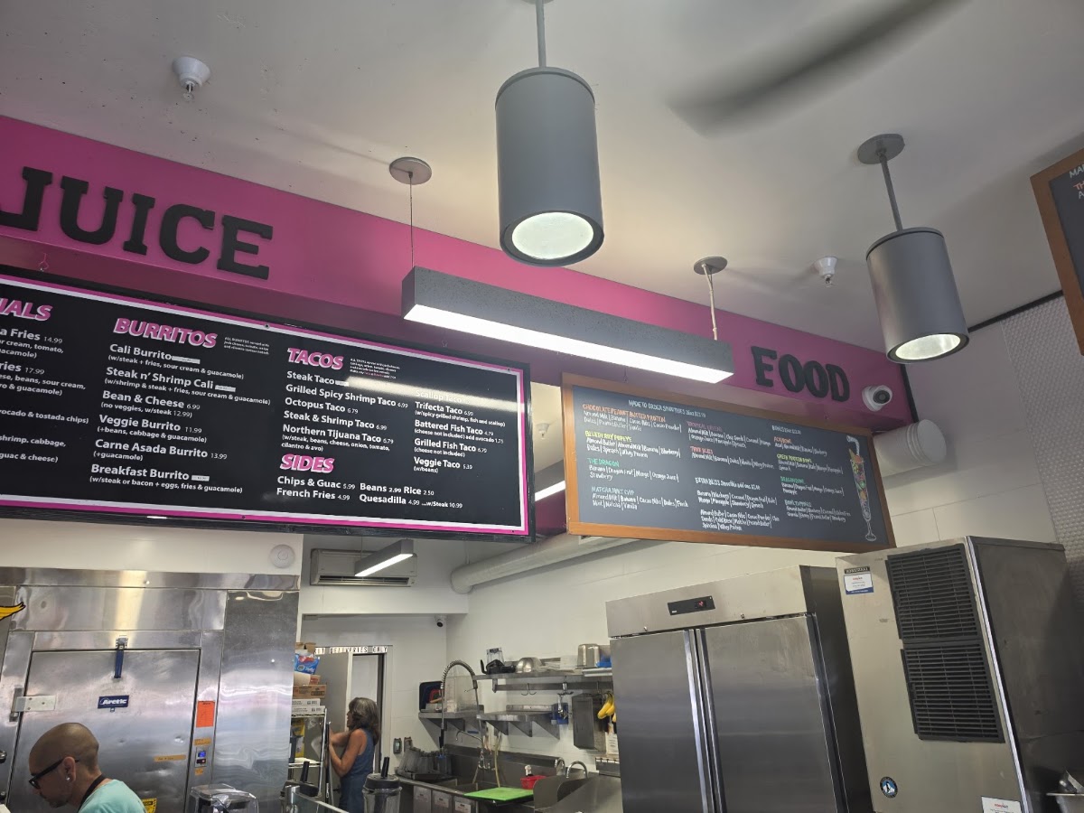 Harry's Taco Club + Juice Bar menu board