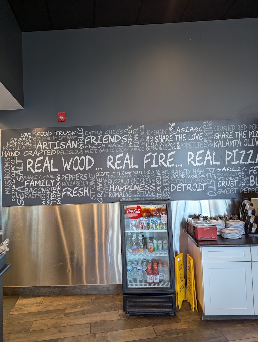 Rollin Stone Wood Fired Pizza menu board