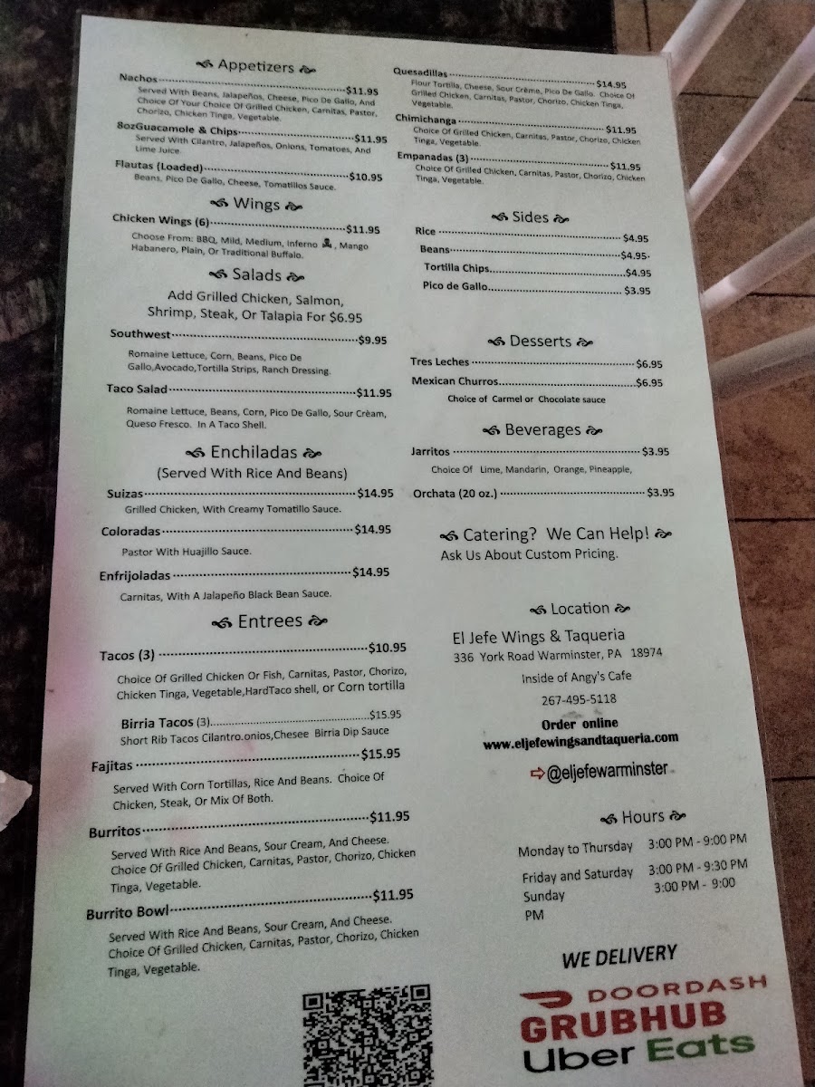 El Jefe Wings and Taqueria menu board