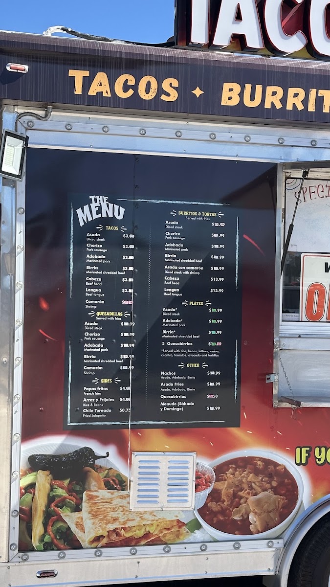 Tacos El Mas Chingon menu board