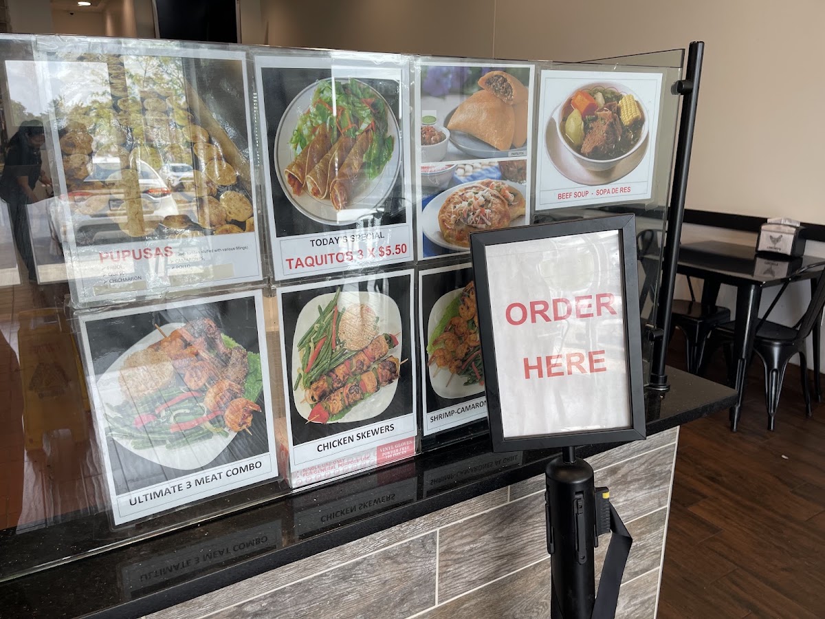 Chicho’s Peruvian Charcoal Chicken menu board