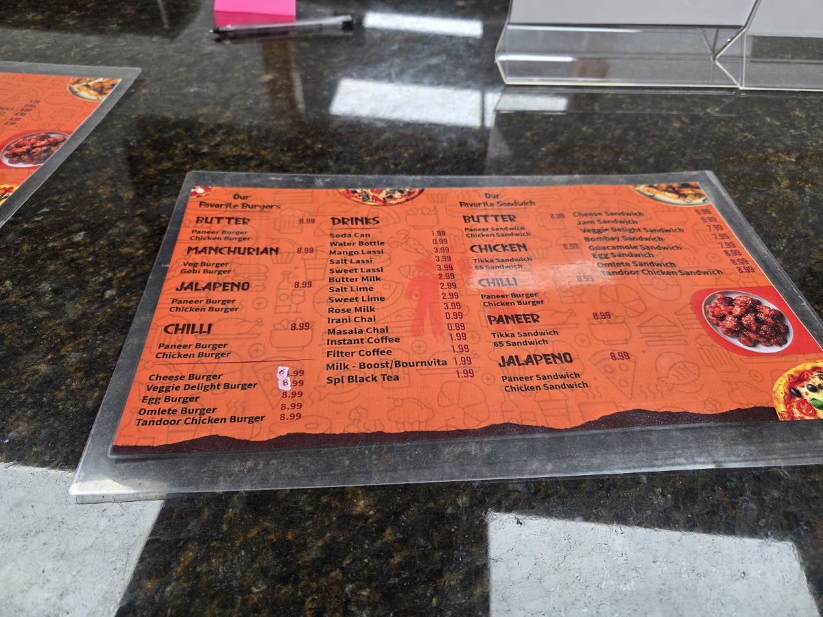Hifi Bros - Indian Pizza, Burgers & Biryani menu board
