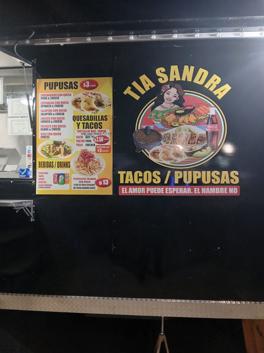 Tacos y Pupusas Tia Sandra menu board