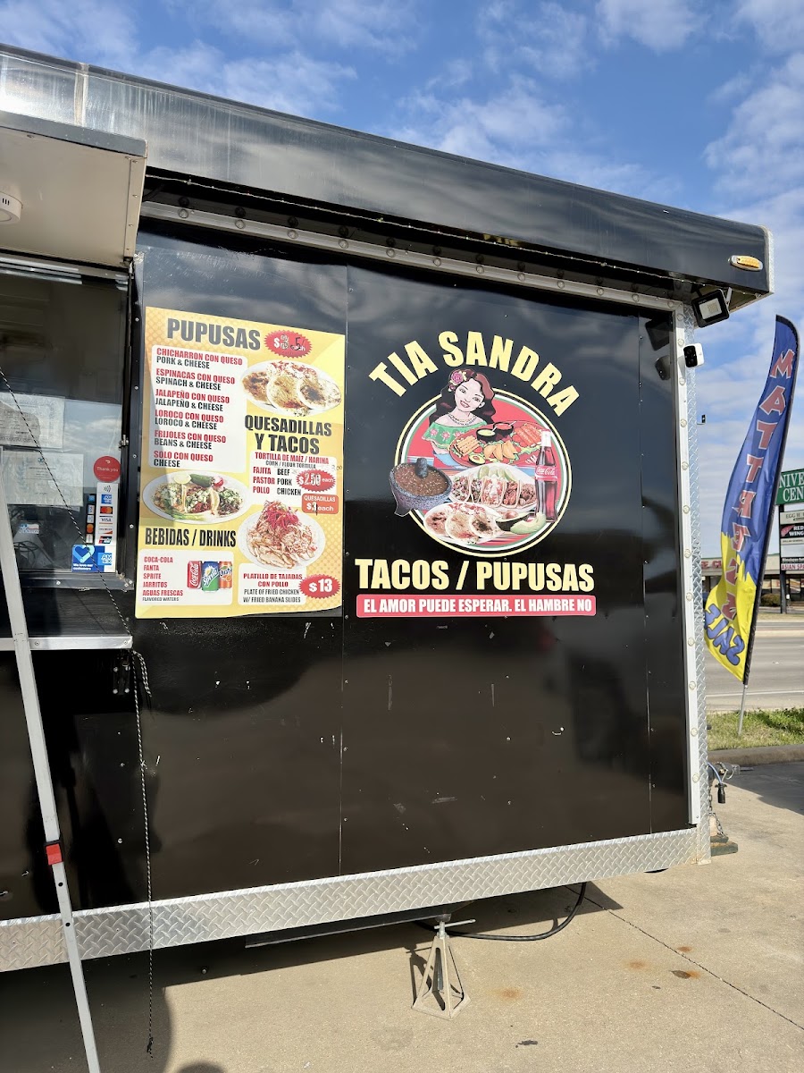 Tacos y Pupusas Tia Sandra menu board