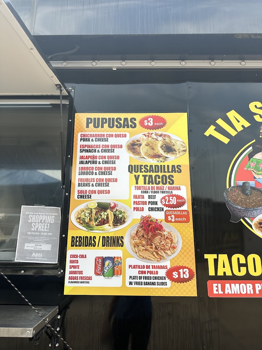 Tacos y Pupusas Tia Sandra menu board