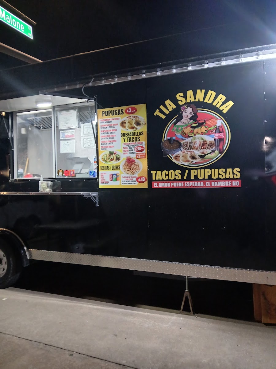 Tacos y Pupusas Tia Sandra menu board