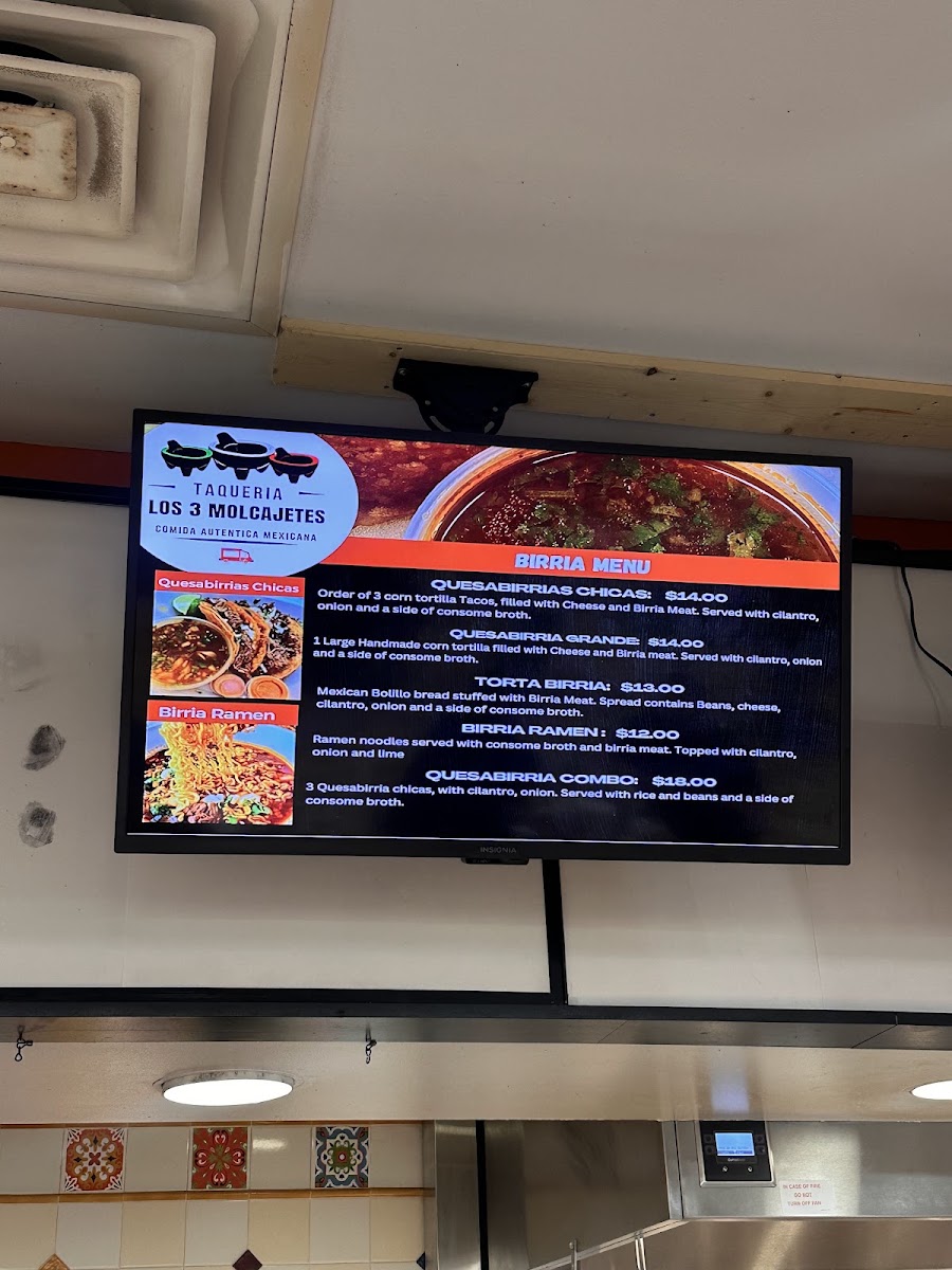 Taqueria Los 3 Molcajetes menu board