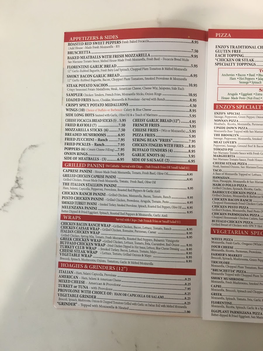 Enzo's Pizza & Pasta menu board