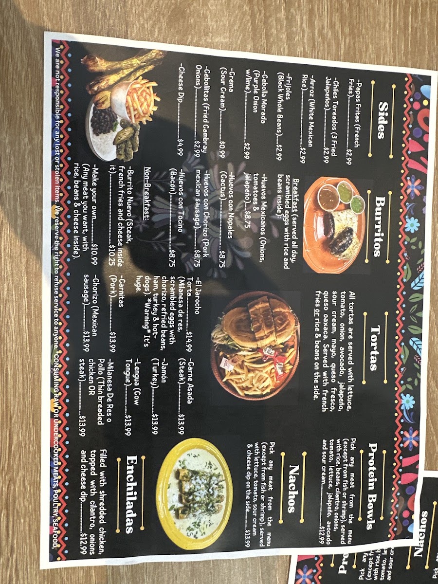 El Jarocho Tienda and Taqueria menu board