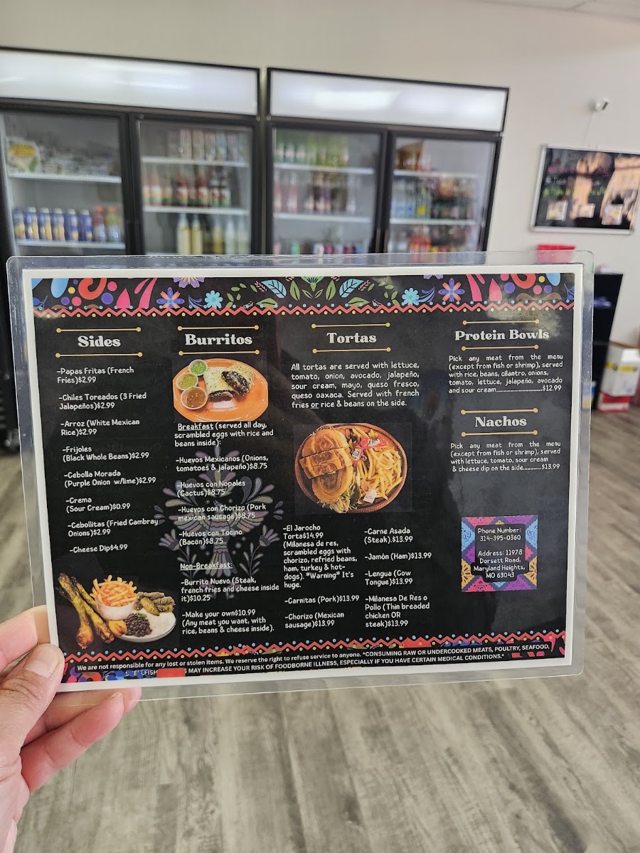 El Jarocho Tienda and Taqueria menu board
