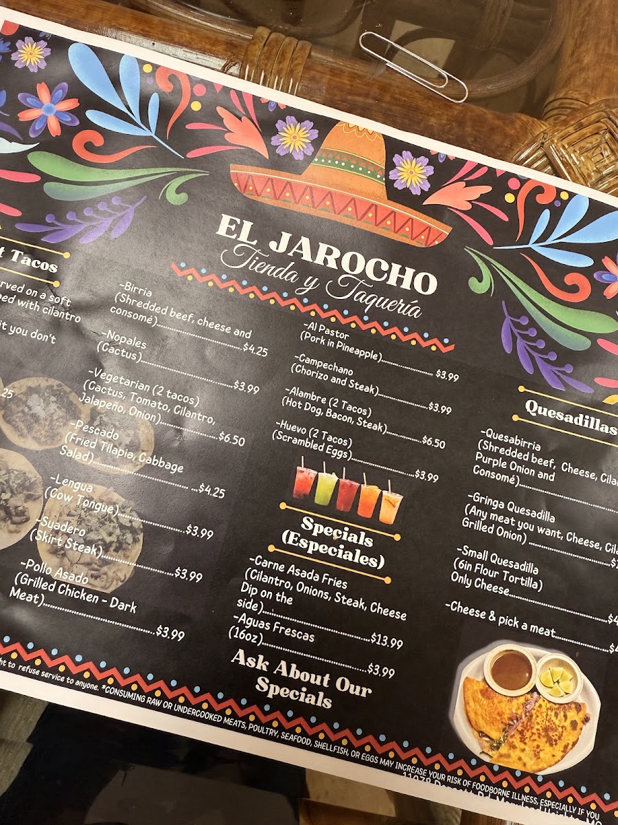 El Jarocho Tienda and Taqueria menu board