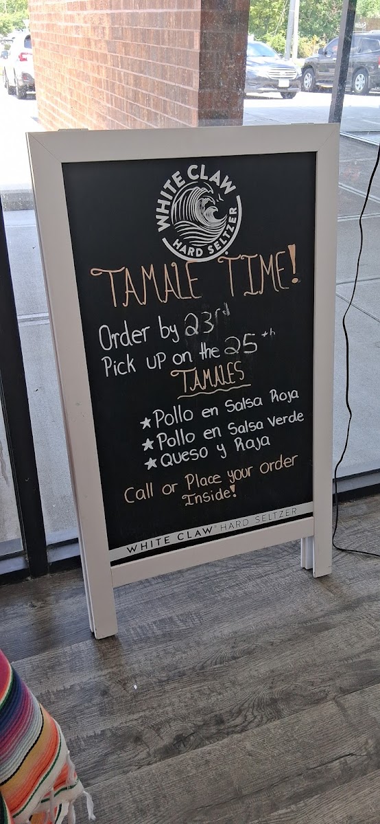 El Jarocho Tienda and Taqueria menu board