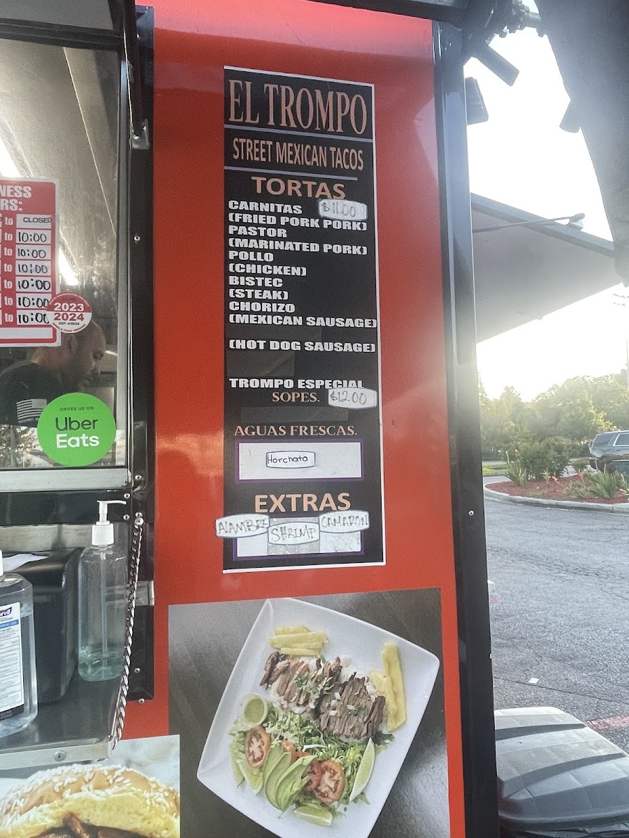 Taqueria El Trompo menu board