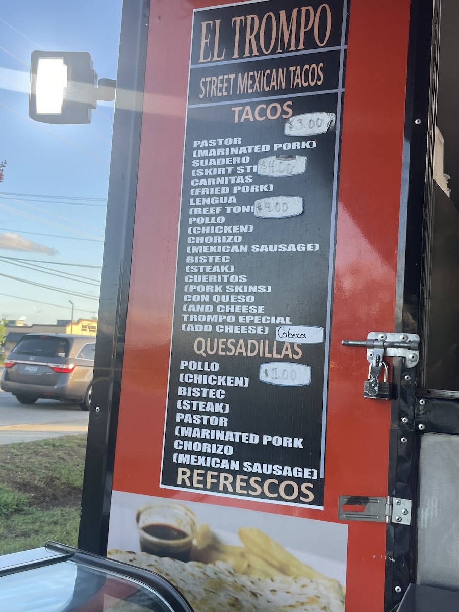 Taqueria El Trompo menu board