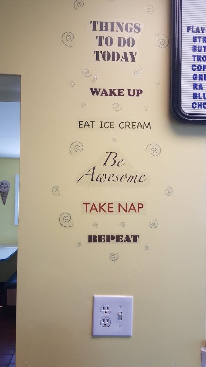 Frosty's Freezer and Pizzeria menu board